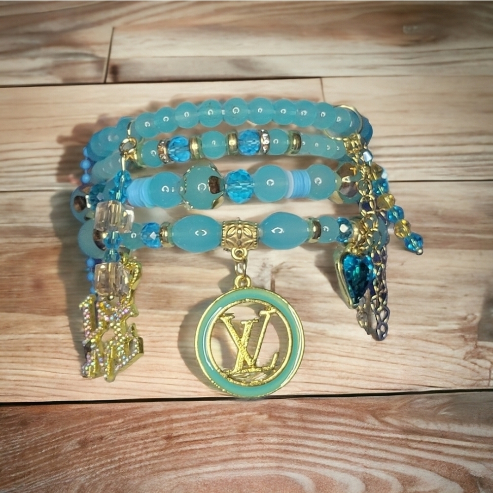 Elegant Gold and Blue Charm Bracelet